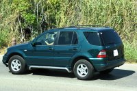 W163